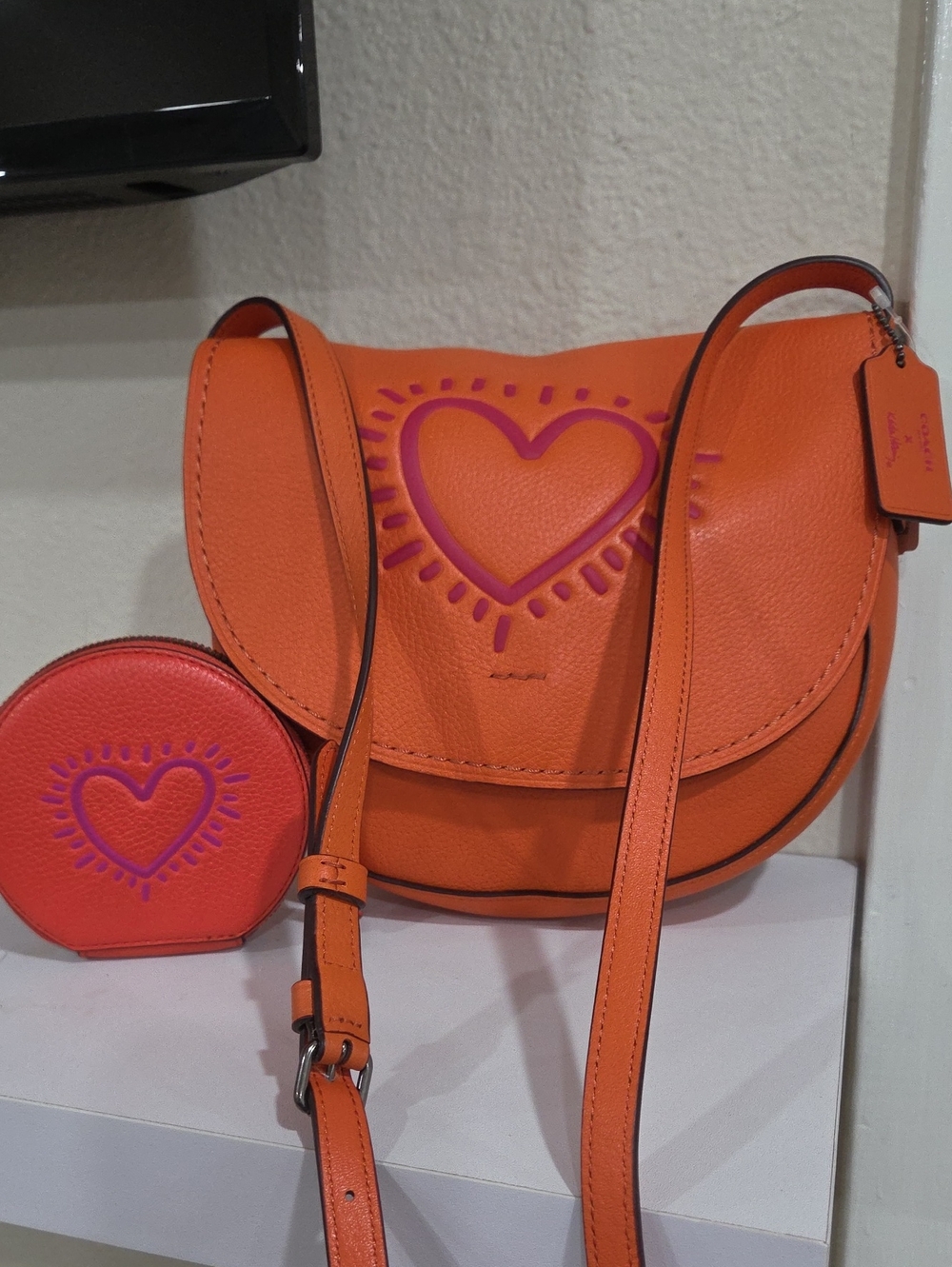 Coach Keith Haring HudsonOrange Pebbled Leather Crossbody with Pink Heart Detail
